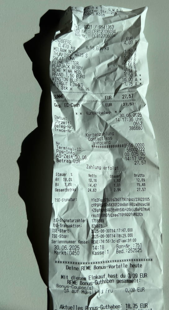 Beispiel eines schlecht fotografierten Bons
